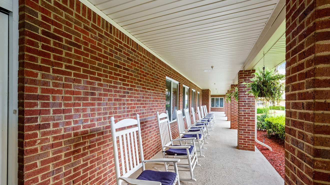front porch with rocking chairs